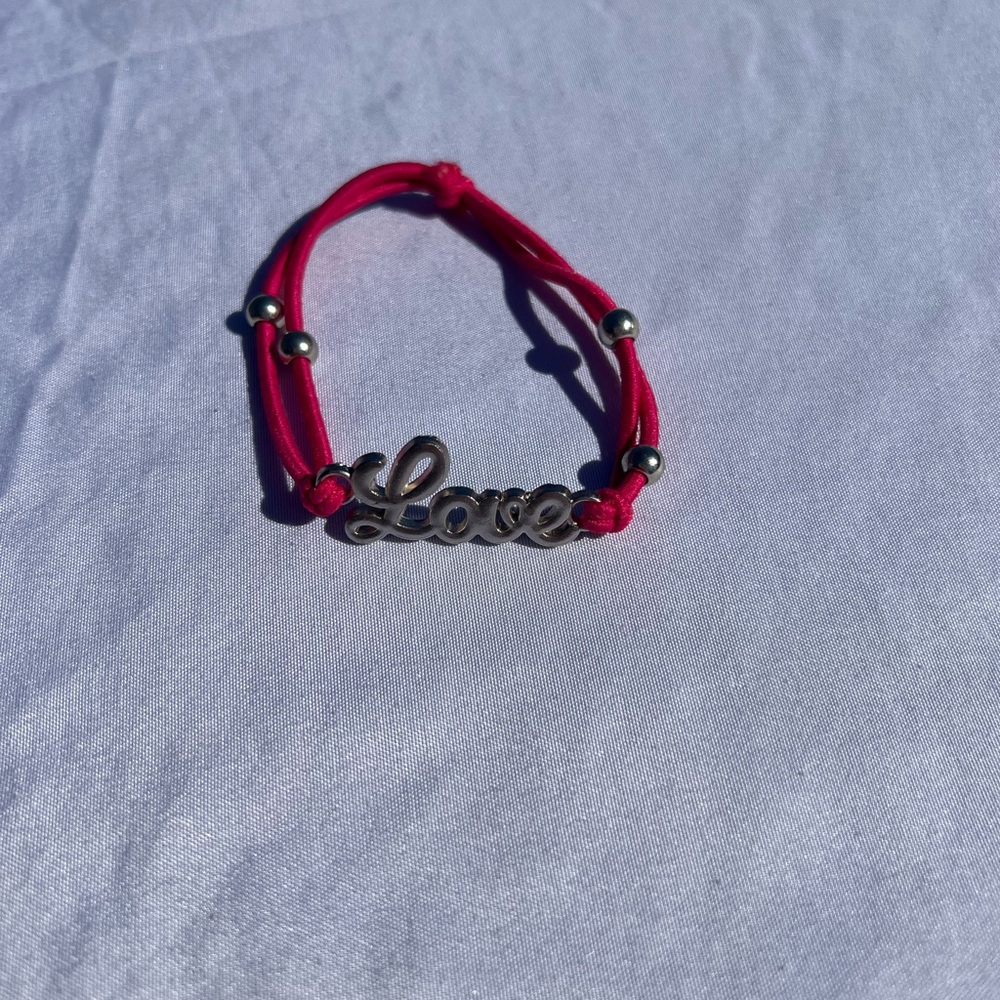 “Love” Bracelet with Silver Accents